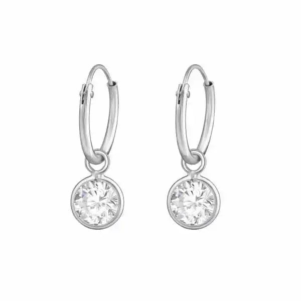 Hopeiset korvarenkaat ja zirkoniat - hopeakorvakorut