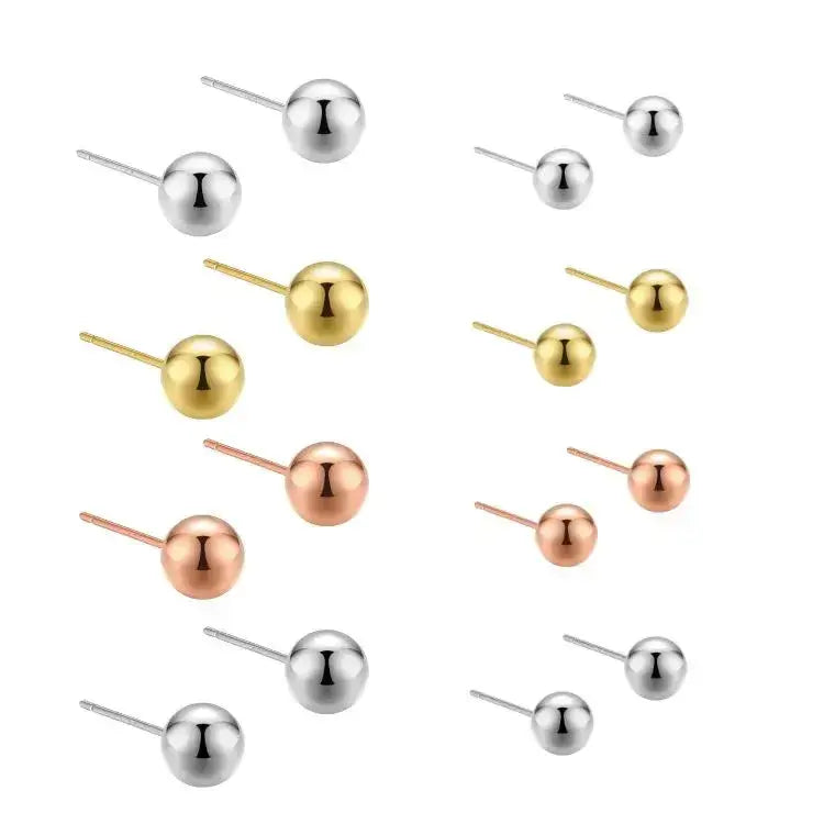 Hopeiset pallokorvakorut HM Koru