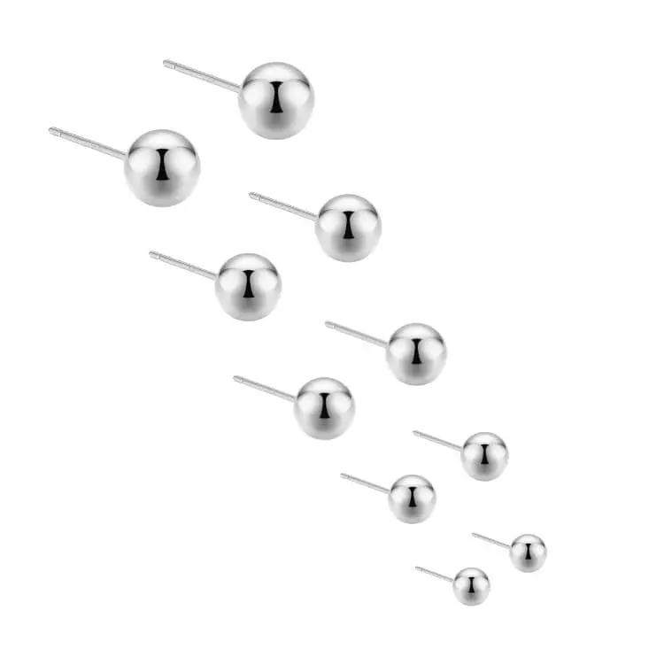 Hopeiset pallokorvakorut HM Koru