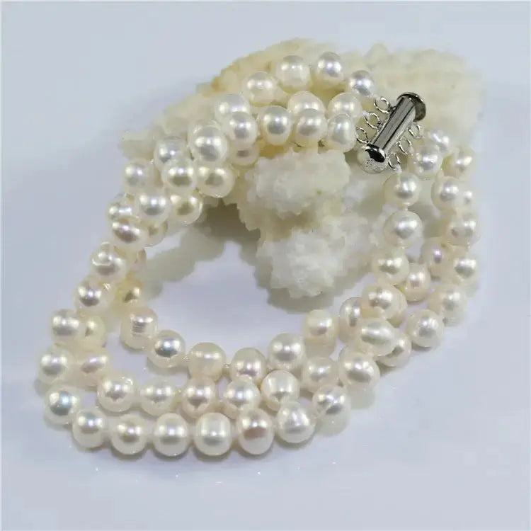 Kolminkertainen helmirannekoru 7 mm helmillä - 18.5 cm - hopearannekoru