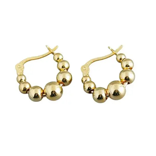 Kullatut hopeakorvarenkaat palloilla - hopeakorvakorut