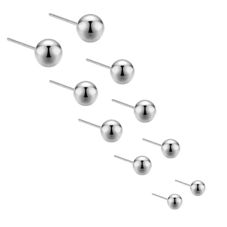 Hopeiset pallokorvakorut HM Koru